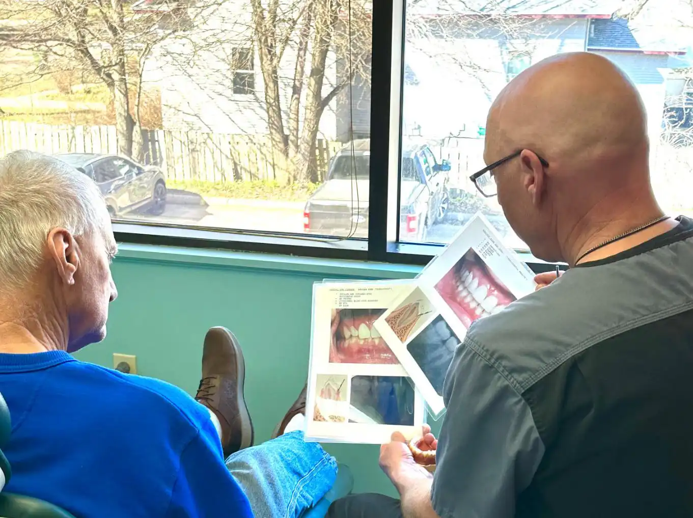 First visit with Dr Feldner reviewing pictures with patient